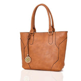 Side view tan Lila Shopper Bag With Charm